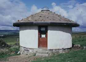 Complete with woodburning stove and the best view from a toilet window ever!